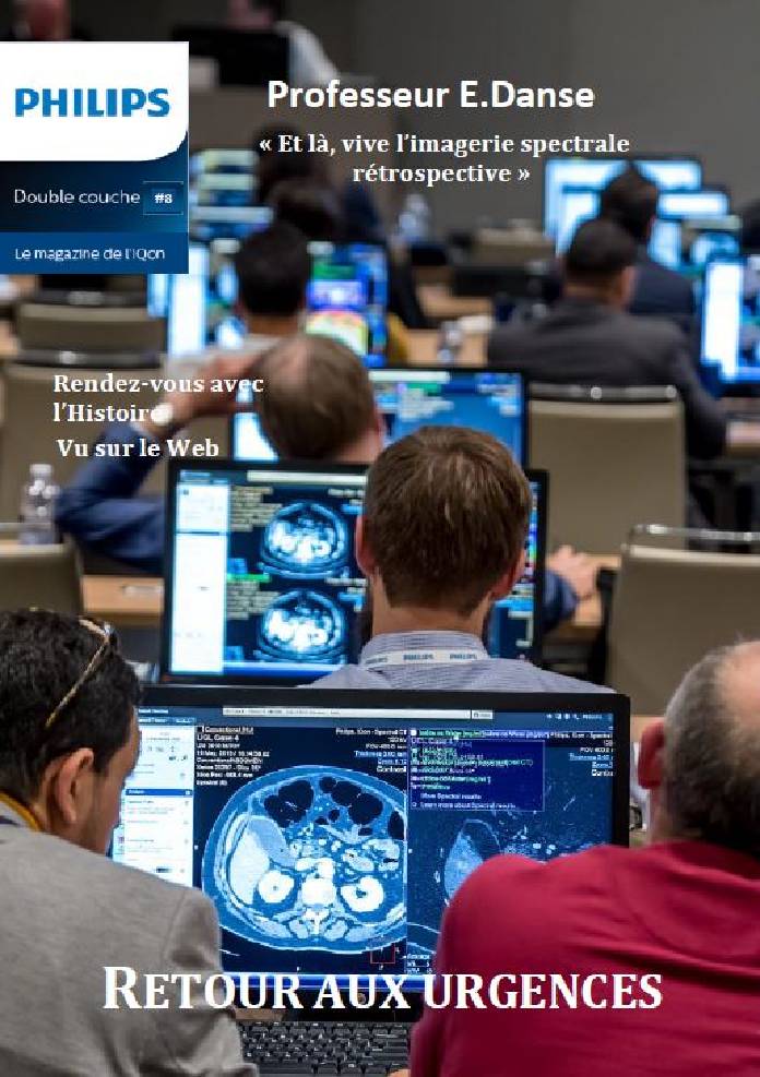 un groupe de personnes assises devant des ordinateurs