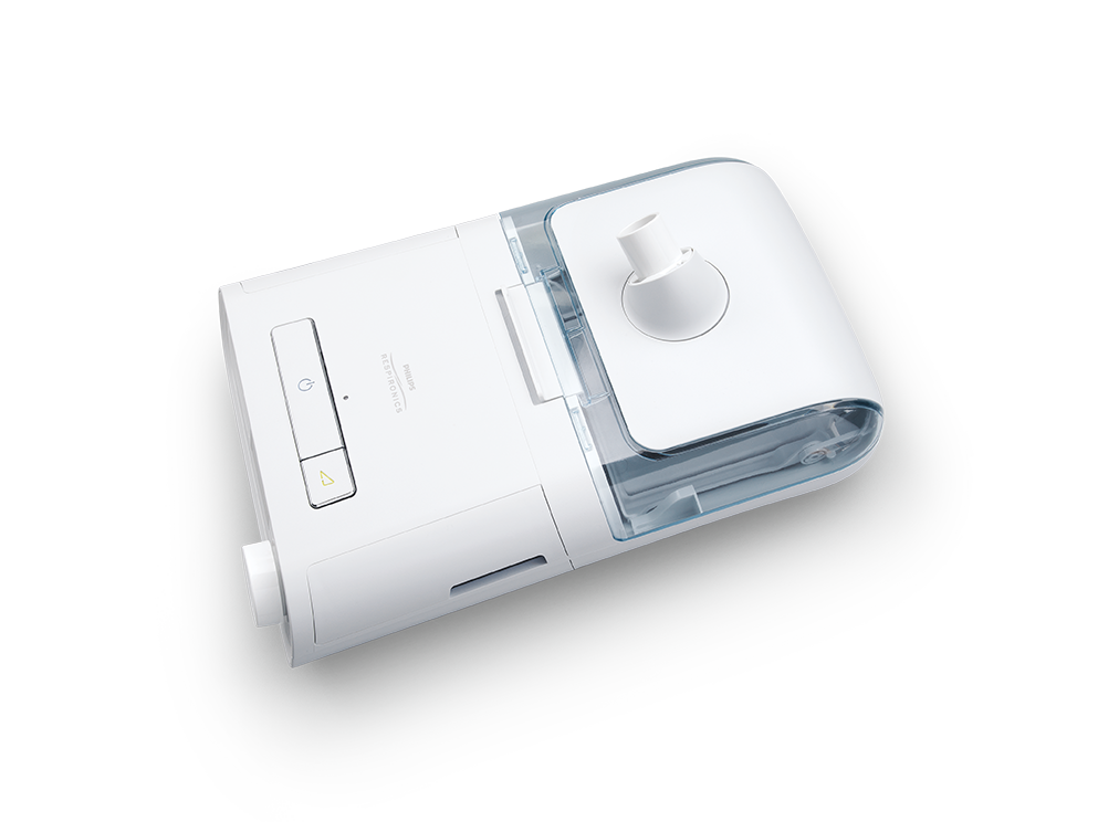 un appareil blanc avec un bouton