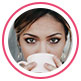 Image de profil d&rsquo;une femme brune, buvant dans une tasse blanche, qui a laiss&eacute; un avis.